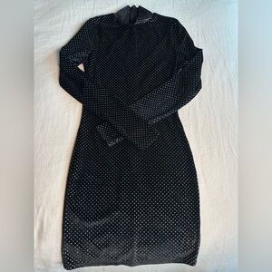 Black mockneck mini dress with gold polka dots